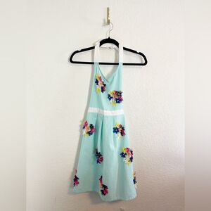 Anthropology retro inspired apron in robin’s egg blue with 3D flowers. NWT